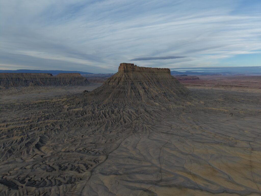 Drone shot of Factory Butte around sunrise 